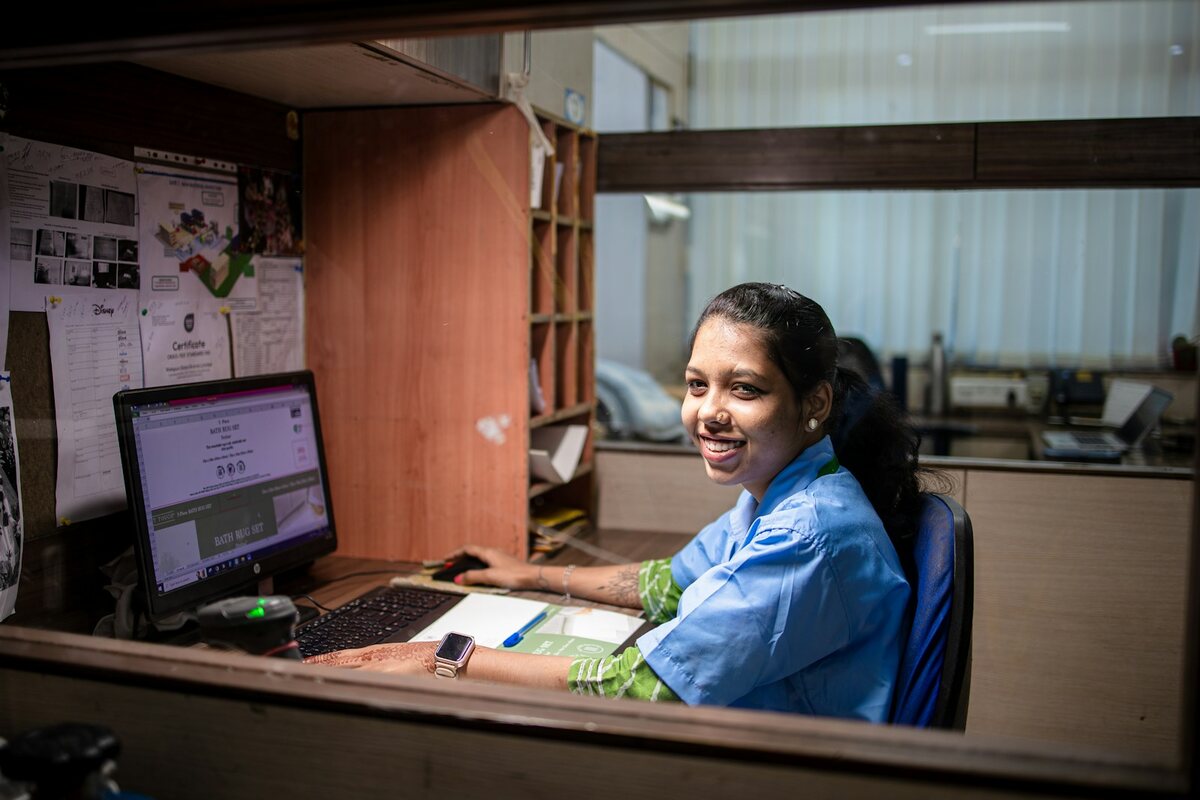 Clinic staff placing an order at the front desk